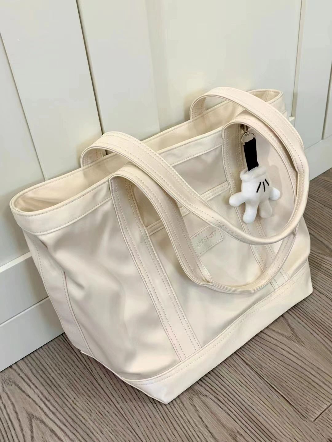 通勤包包2026新款大容量帆布包学生上课手提单肩包简约百搭托特包