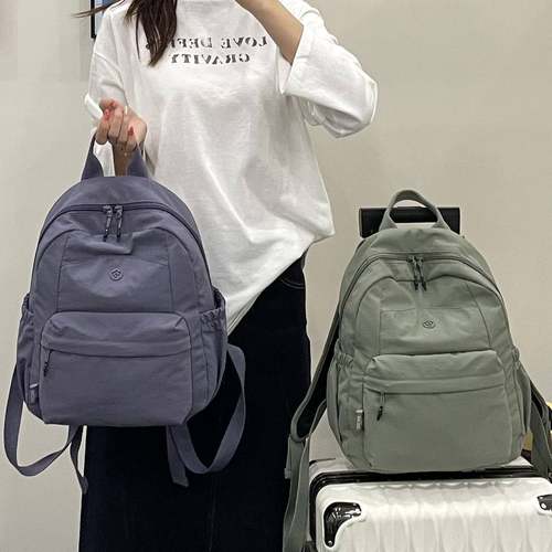 简约纯色小众超轻双肩包大容量休闲旅行背包大学生书包双肩背包