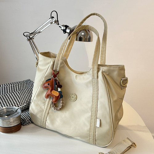 轻奢小众尼龙布包包女新款大容量休闲单肩包简约百搭托特包通勤包