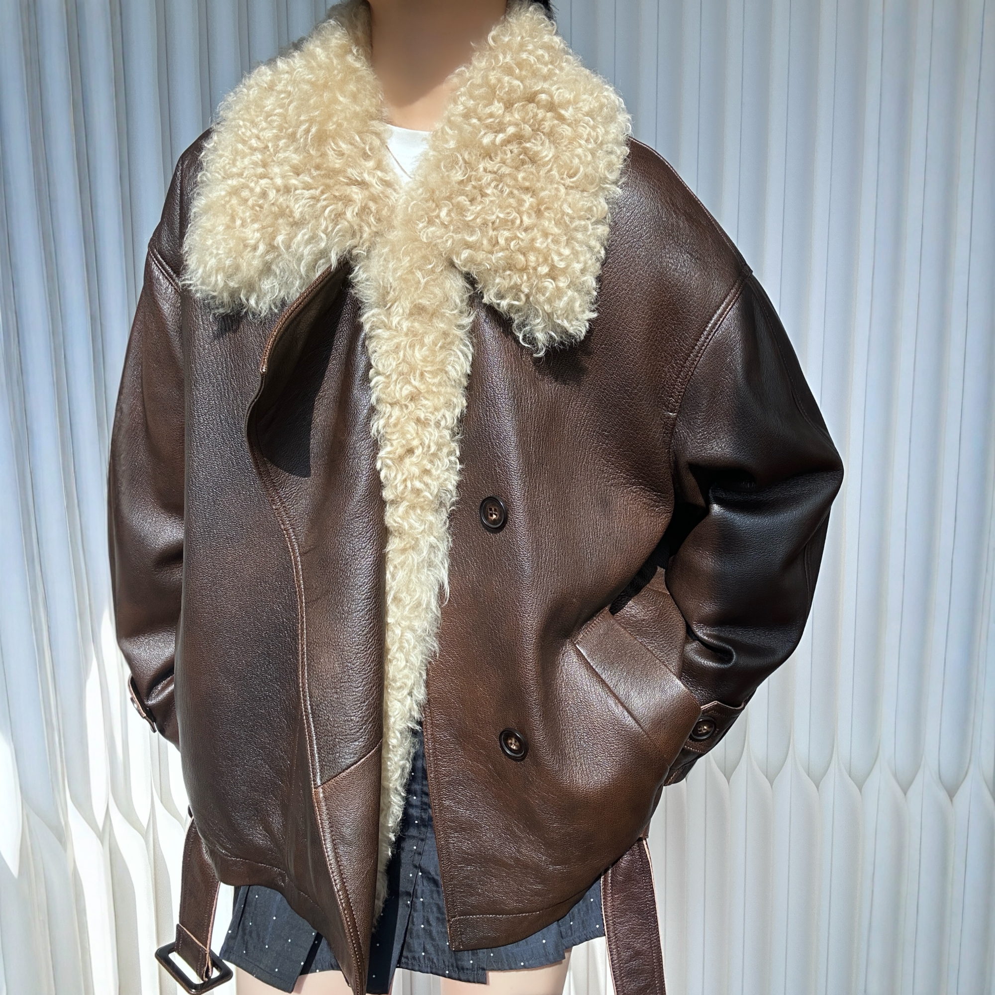 水磨双色皮毛一体领短款机车皮衣