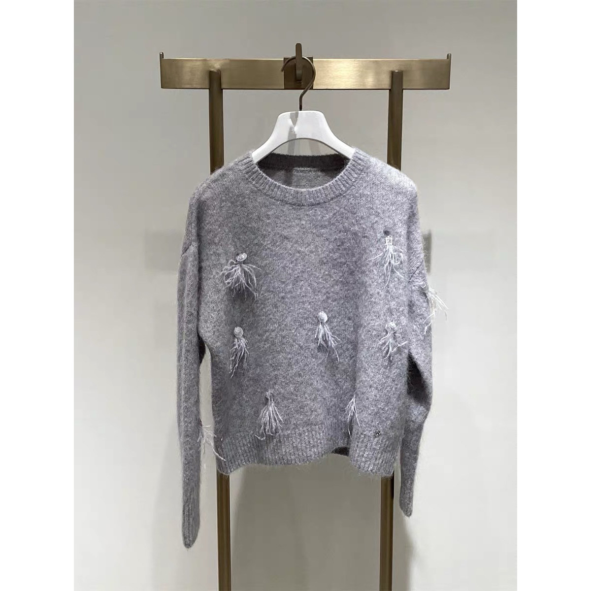 伊折扣2025冬新款羊毛针织衫通勤百搭简约设计感毛衣1GC133411