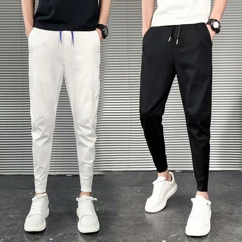 薄款裤子男2025春夏修身束脚九分社会小伙韩版潮流白色小脚哈伦裤