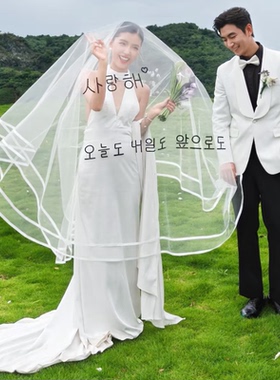 婚纱照外景草坪婚礼拍照新娘头纱