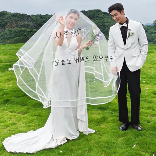 婚纱照外景草坪婚礼拍照新娘头纱