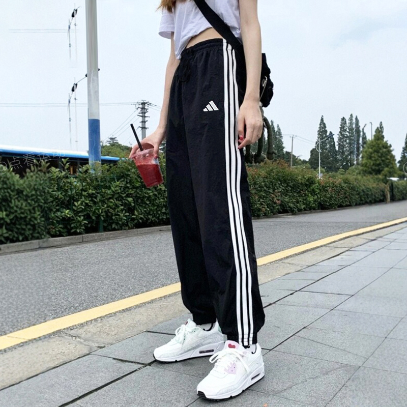 阿迪达斯长裤女款下装2025秋季新款女装跑步健身运动服透气束脚裤