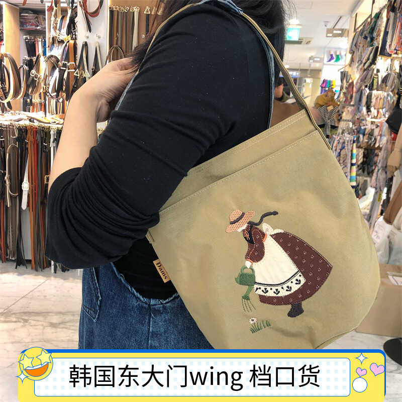 花裙女孩水桶包韩国手拎包可单肩
