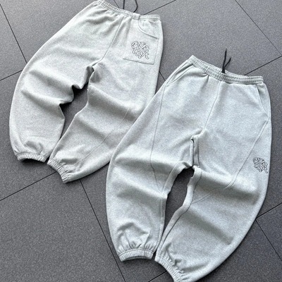 Streamlined stitching embroidered logo casual pants