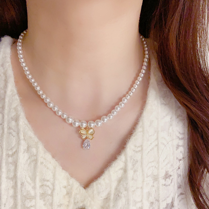 法式时尚猫眼石蝴蝶水滴形吊坠珍珠项链少女气质甜美高级感锁骨链