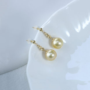 11mm18K金近正圆南洋金珠紫珍珠耳环