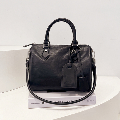 大容量植鞣头层牛皮波士顿枕头包