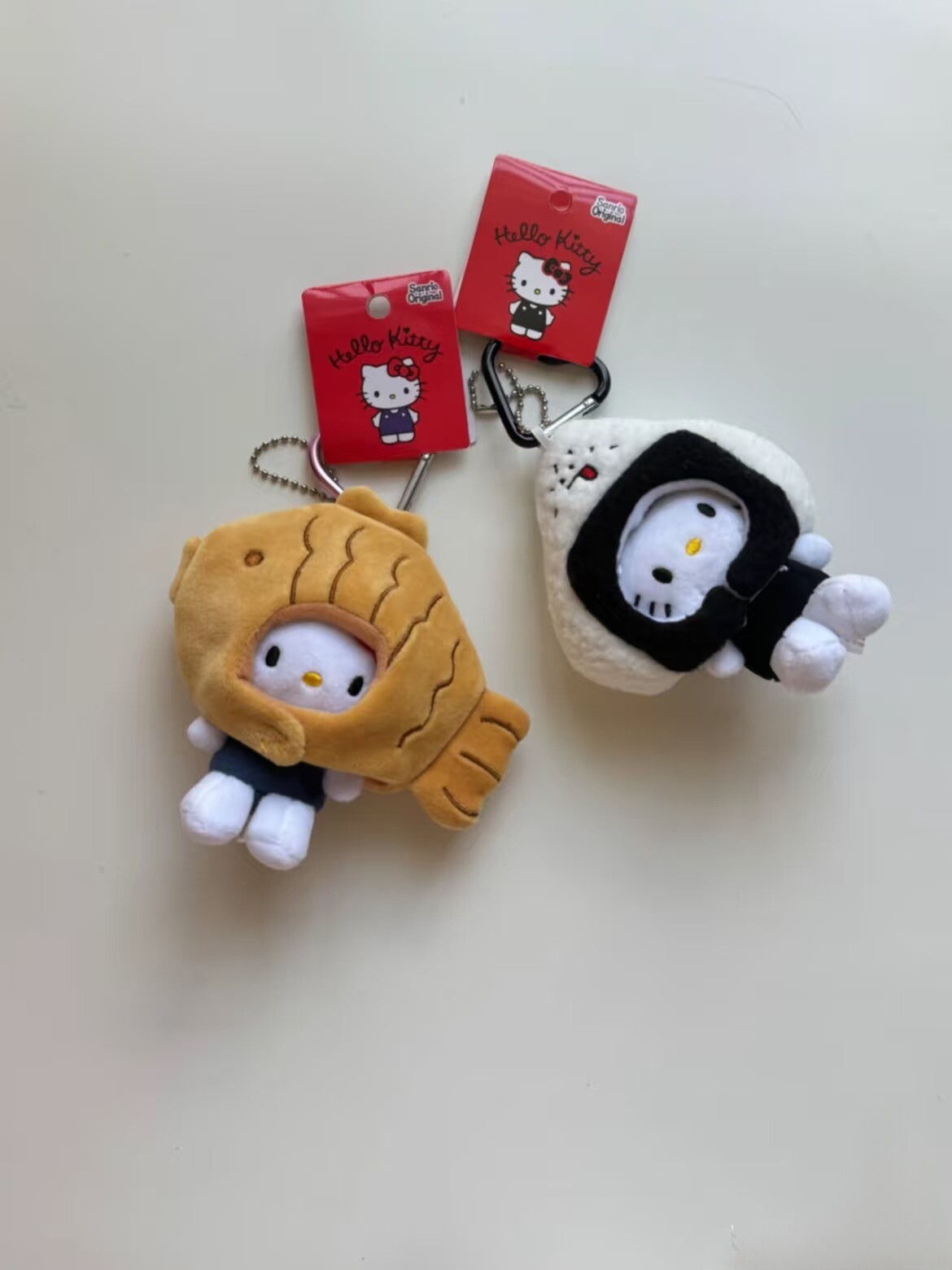 实拍-日本饭团kitty猫公仔包包挂件搞怪头套毛绒玩偶凯蒂猫鲷鱼烧