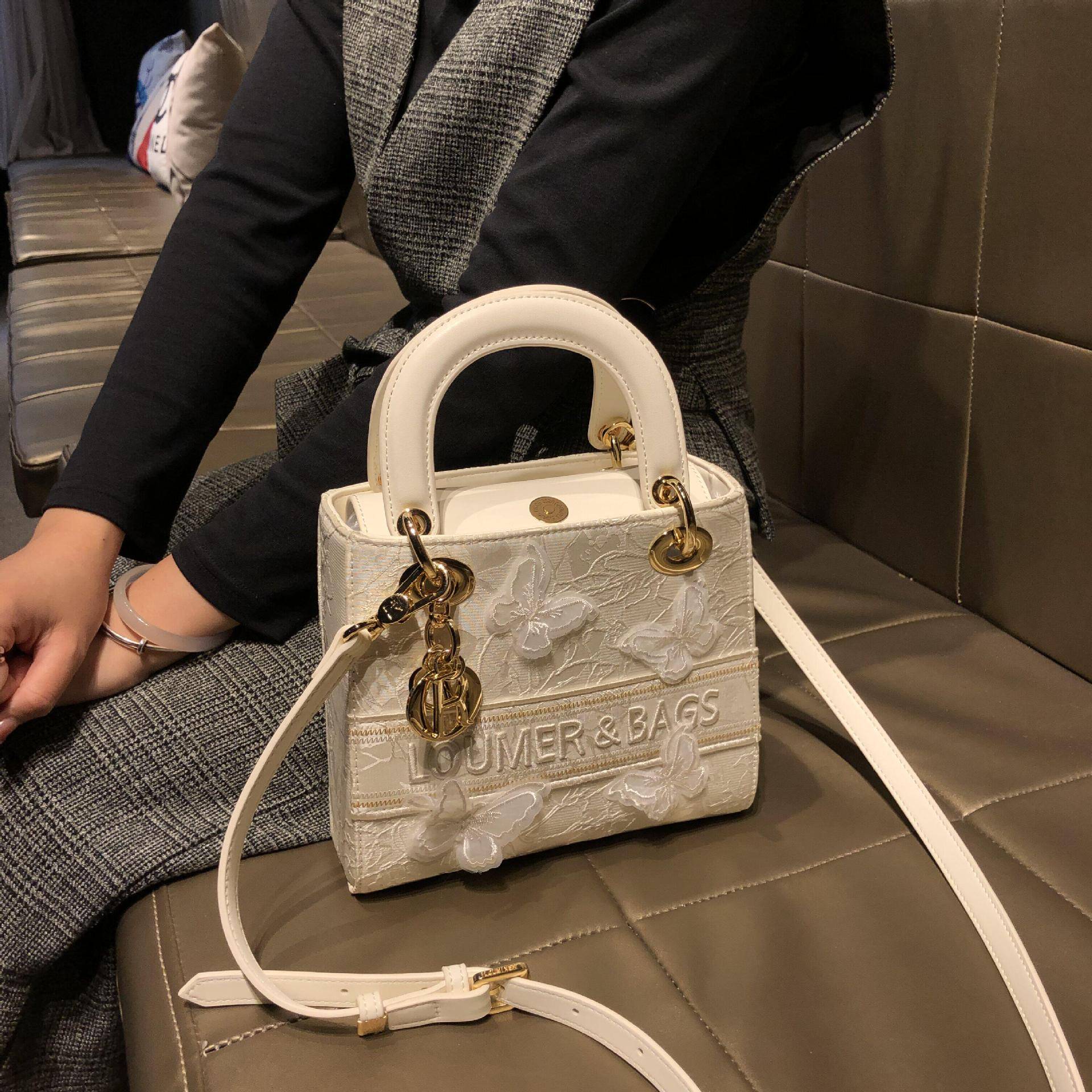 香港专柜正品新中式真皮女手提图片
