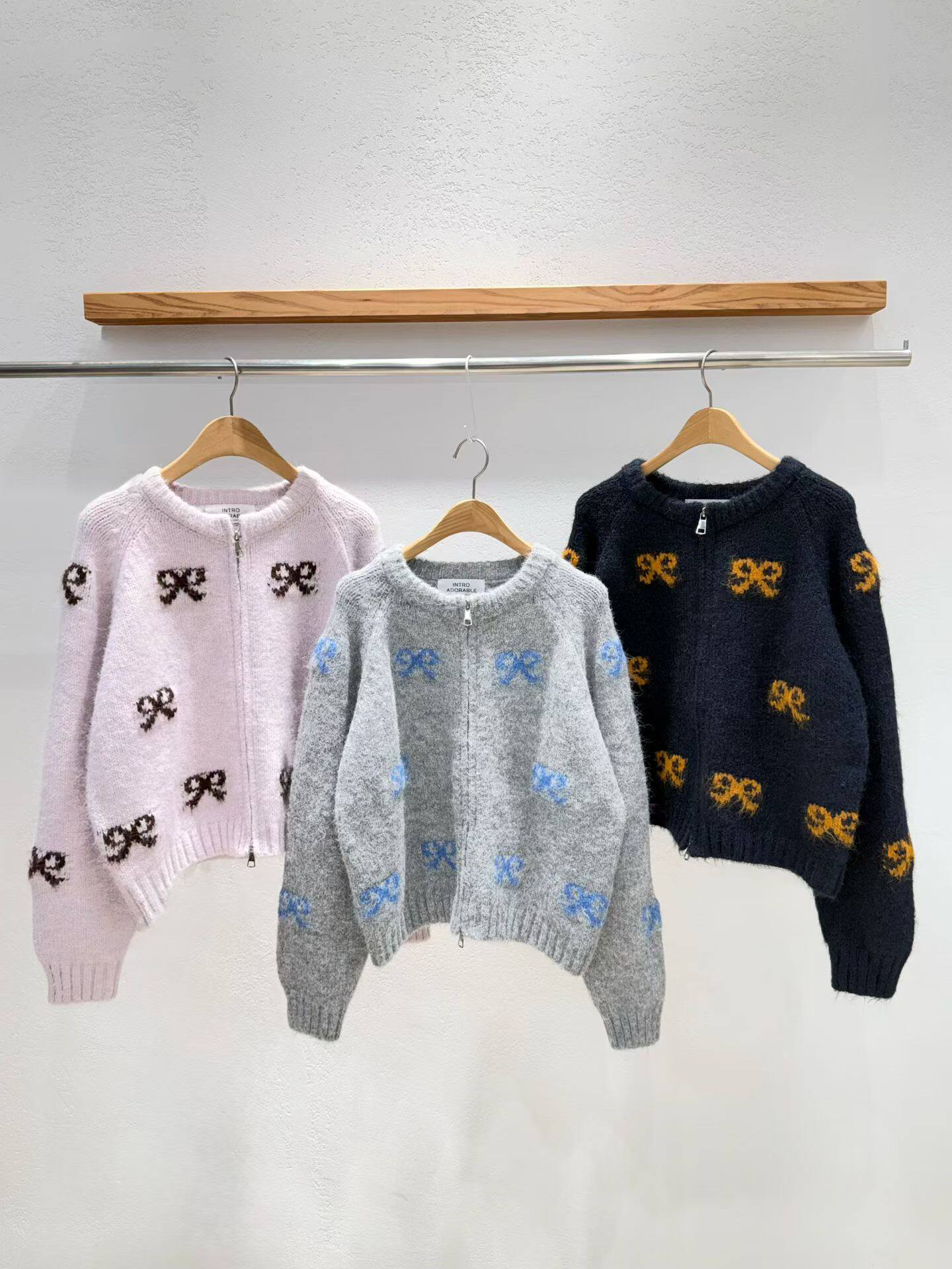 韩国东大门2026春季新品INTRO时尚甜美蝴蝶结拉链针织开衫