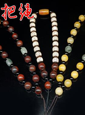 桂林鸡血编制绳玉珠把玩件手链