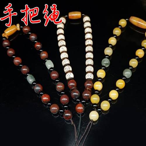 桂林鸡血编制绳玉珠把玩件手链