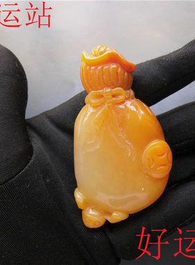 黄龙玉钱袋子手把件黄蜡石摆件