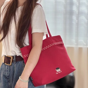 韩系文艺通勤刺绣女孩通勤单肩帆布包日常休闲百搭学生手提托特包