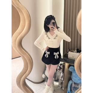 AZZHEN 重工挂脖毛衣 风传花信