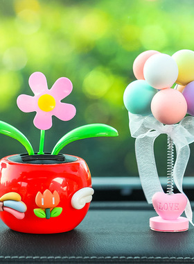 汽车摆件太阳能夏季车内装饰网红车载太阳花中控台高级感小摆件女