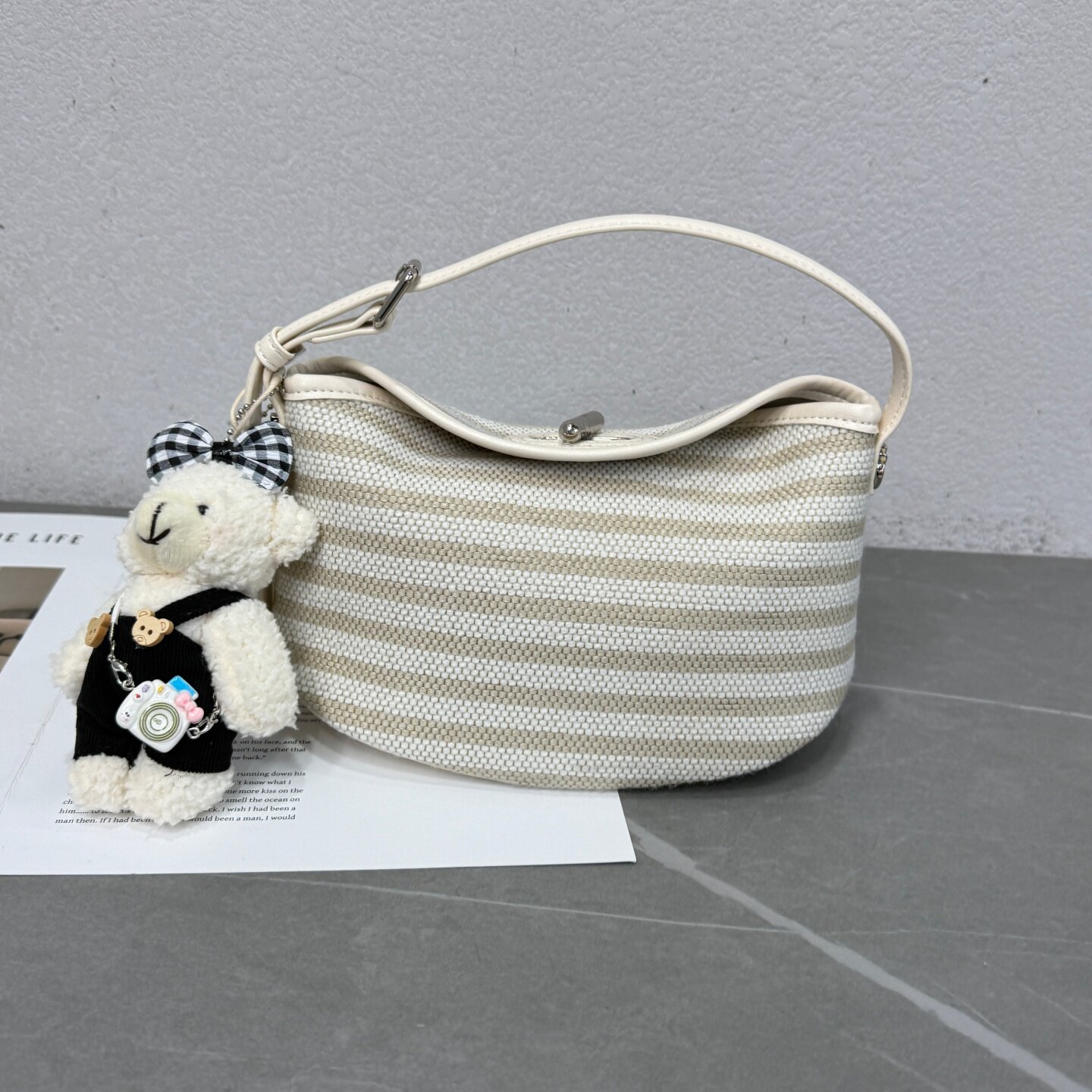 小众简约休闲条纹元宝包2026新款百搭时尚饺子包拼接帆布斜挎包女