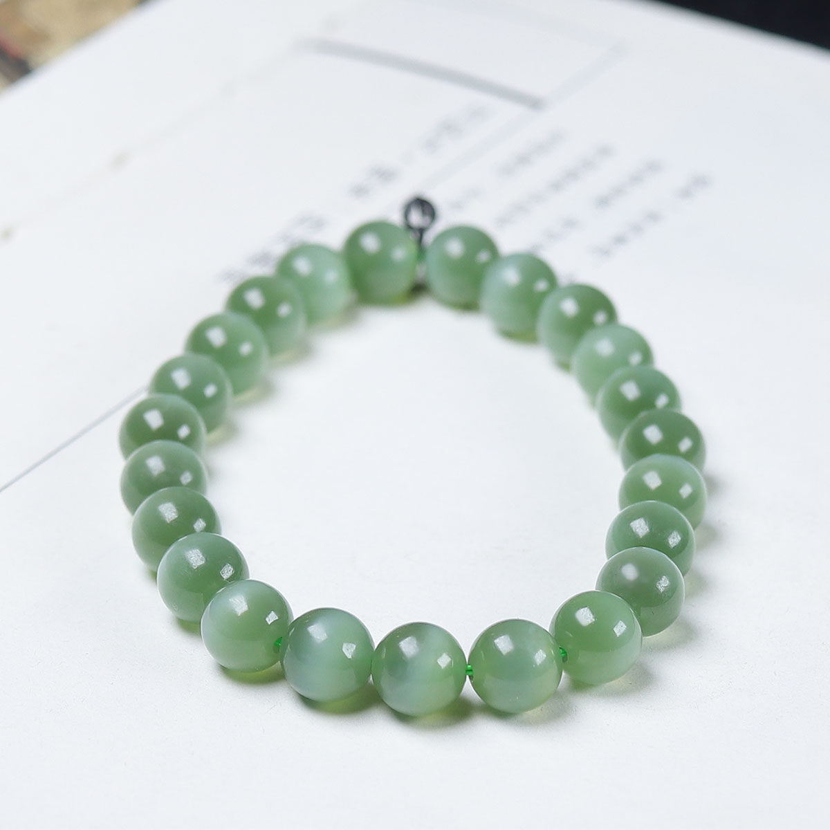 （古晨珠宝）俄罗斯和田玉冰底粉青猫眼碧玉圆珠手串手链17g7+mm