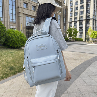 日系女大学生双肩包2025新款男高中生皮质书包大容量旅行电脑背包