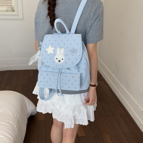 少女感波点印花双肩包2026超火好看的抽绳翻盖书包女生出游小背包