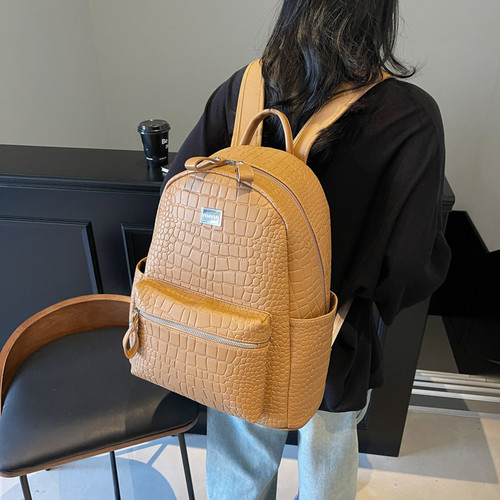 港风潮牌石头纹双肩包大容量质感压花背包学生书包通勤皮质电脑包