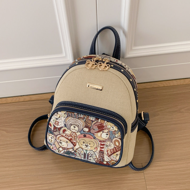 英伦风撞色拼接帆布双肩包女卡通小熊乐园小书包百搭时髦旅游背包
