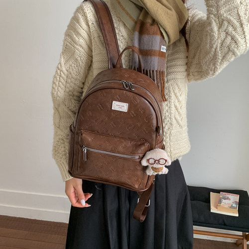 复古暗纹压花双肩包女旅行用皮质小型背包可爱卡通猫猫女生小书包