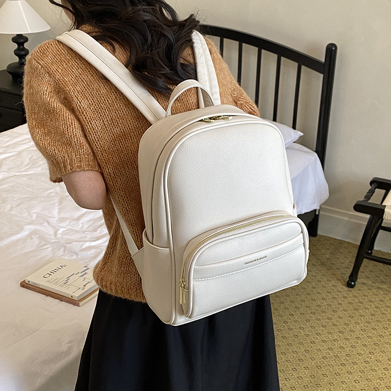 超好看双肩背包女士2026新款韩版旅游轻便高颜值纯色皮质白色书包