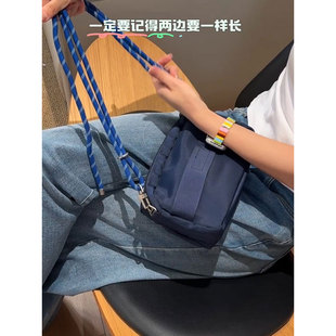 防水复合牛津尼龙帆布包2025新款男女通用运动单肩斜挎小包相机包