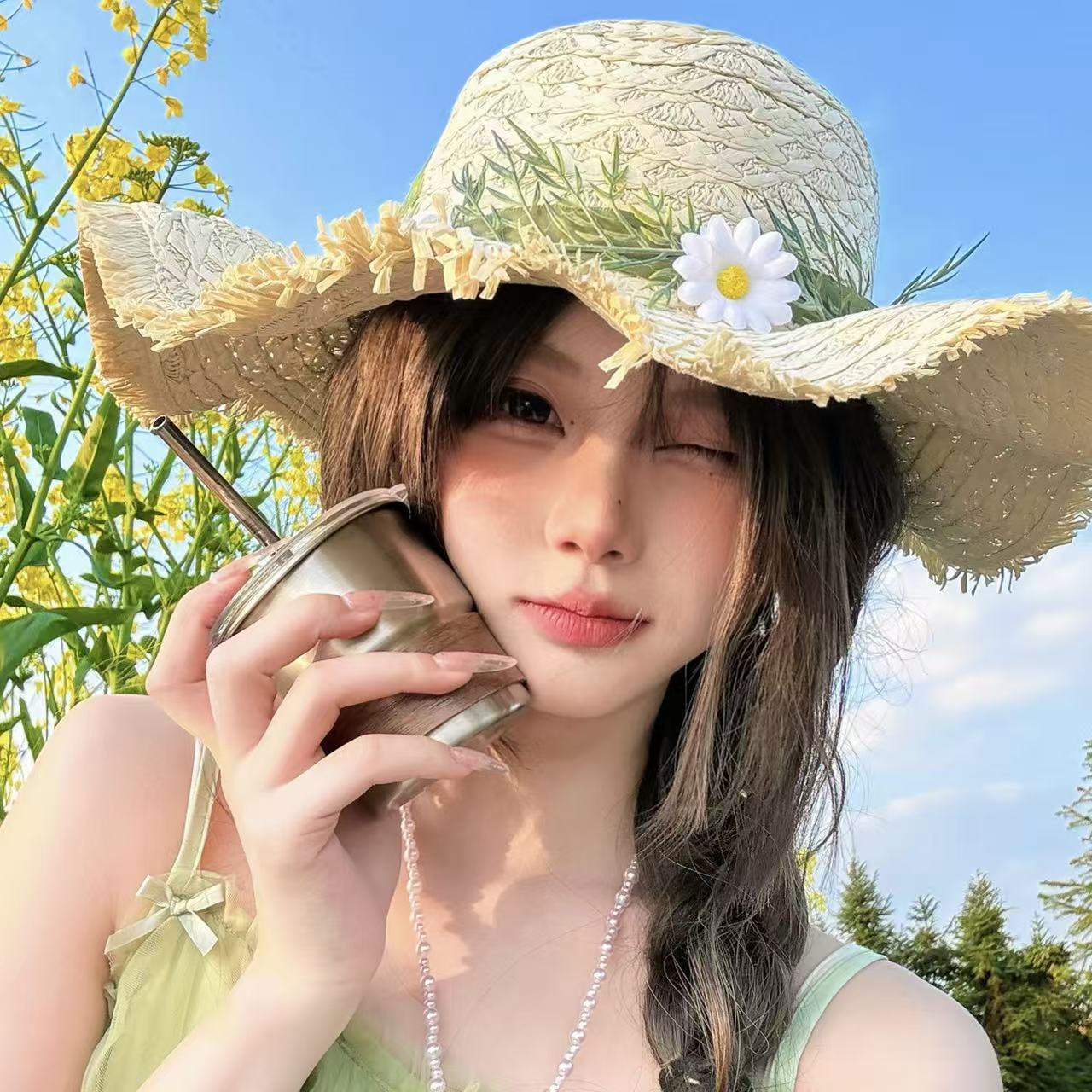 新款小雏菊花环草帽甜美草编遮阳帽大帽檐海边防紫外线沙滩帽子女