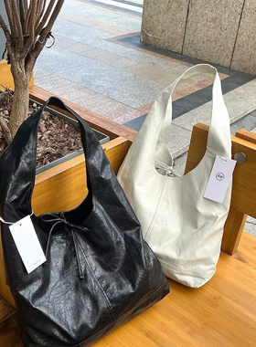 韩国depound蝴蝶结绑带三角流浪明星包法式慵懒托特包软皮手提包