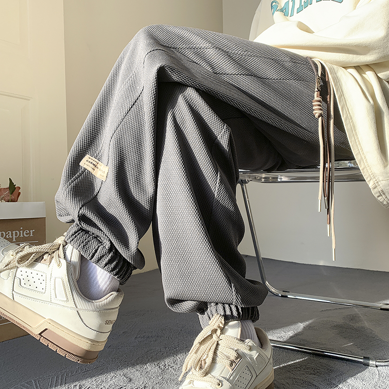 春季新款美式高街休闲卫裤男生纯色贴标潮牌青年百搭运动束脚裤子