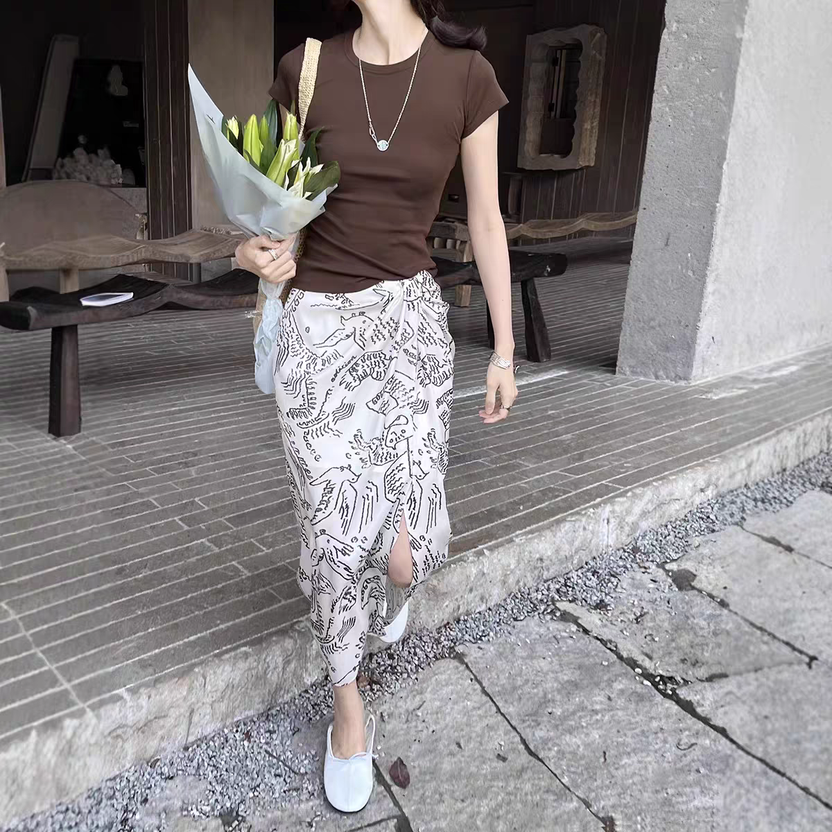 GRACETINA HOO|法式时髦松弛感通勤|印花扭结前开衩半身裙女夏