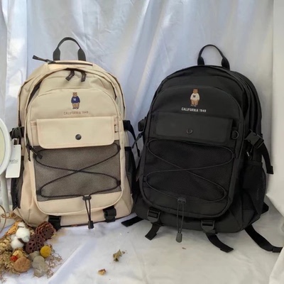 韩国代购 WHOAU小熊刺绣书包字母印花大容量双肩背包旅行包男女款