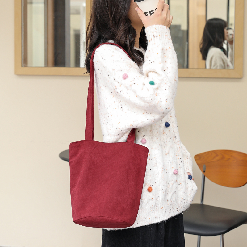 日系时尚绒布水桶包女复古质感