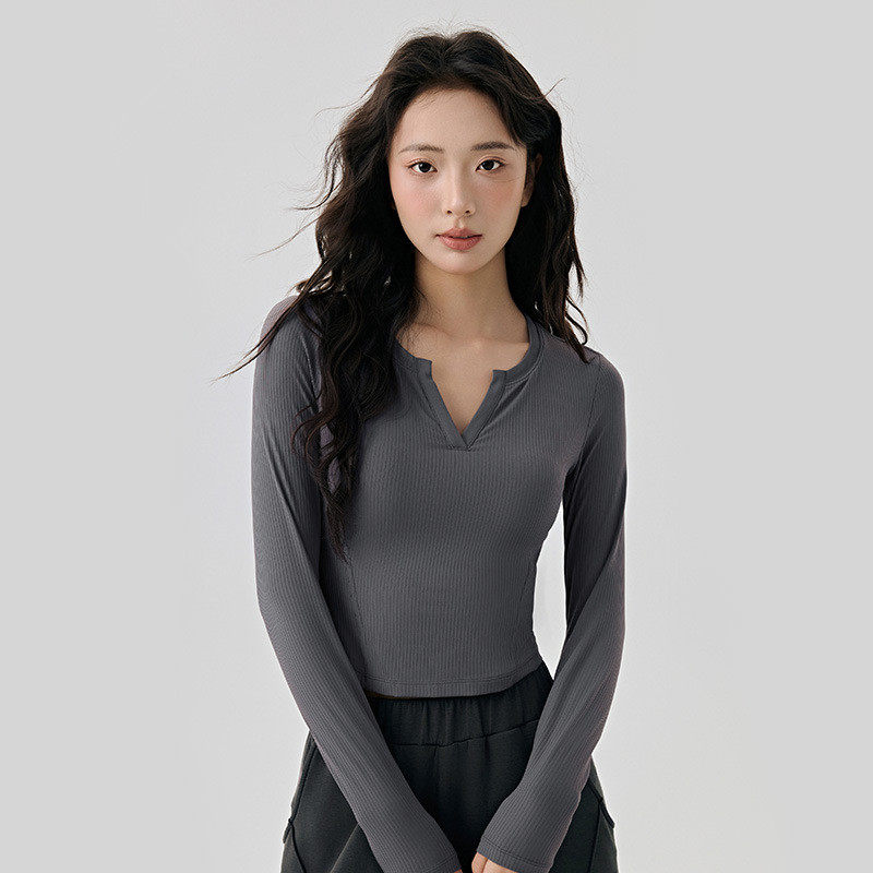 含胸垫假两件健身衣训练长袖女