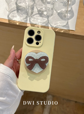DWI STUDIO高级感奶黄棕色蝴蝶结磁吸支架挂绳手机壳17promax全包AI按键适用苹果16promax液态硅胶壳15/14