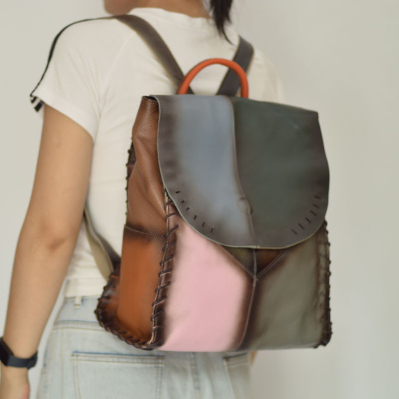 时尚拼接彩色牛皮背包女士休闲包书包双肩包欧美新款真皮女包