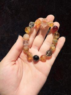 11m黄塔发晶石榴茶晶方糖白水晶等金霸手串手链品质上乘暴力招米