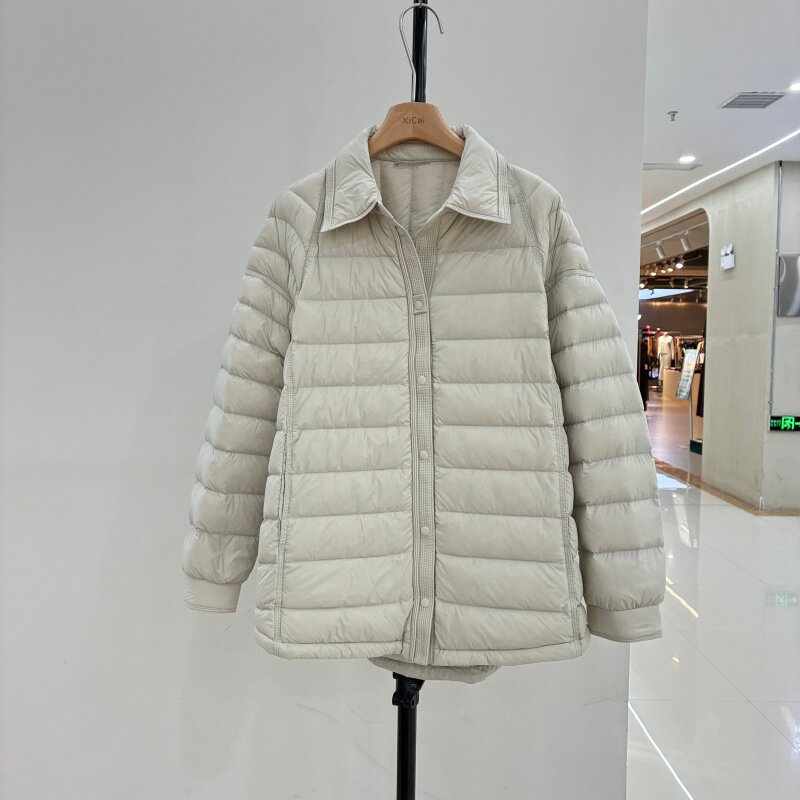 欧货2026冬轻薄翻领单排扣羽绒服女宽松休闲90白鸭绒中长款外套