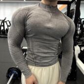 弹力速干无缝提花显大健身衣运动长袖 透气修身 休闲半拉链训练服男