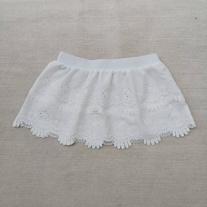 早春新款韩系时尚蕾丝花边下摆遮屁帘叠穿打底裙百搭白色半身裙