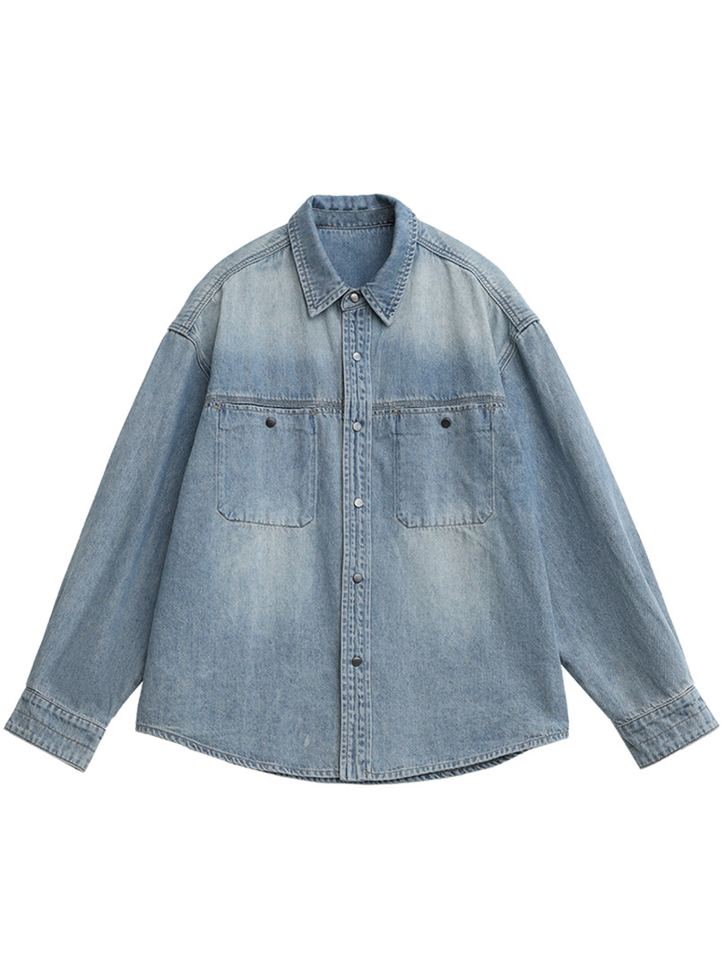 Light blue denim button-up shirt jacket laid flat on a white background