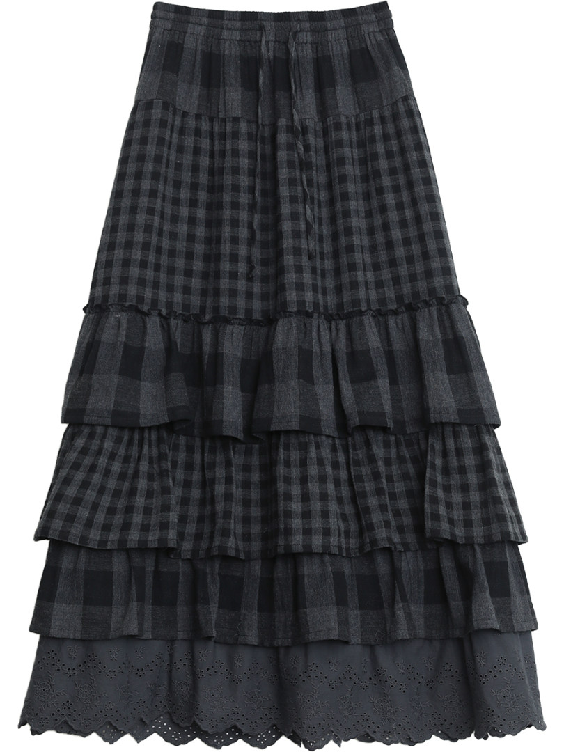 Black plaid tiered skirt laid flat on a white background
