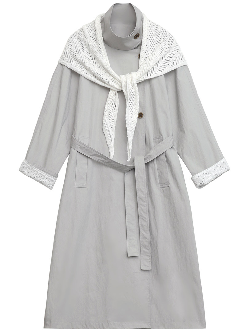 Light gray long coat with white knit shawl collar on white background