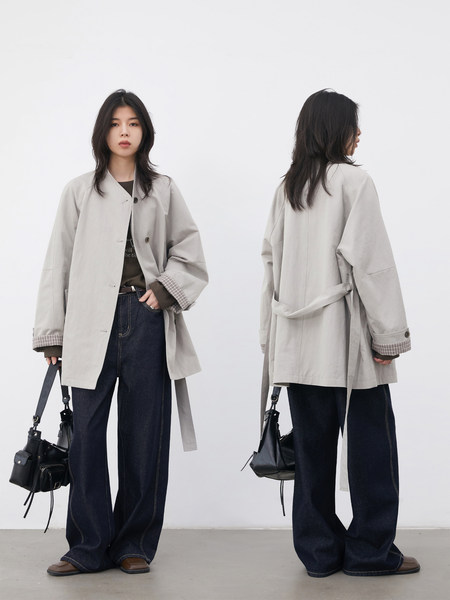 Light beige oversized belted coat worn by a model, shown front and back