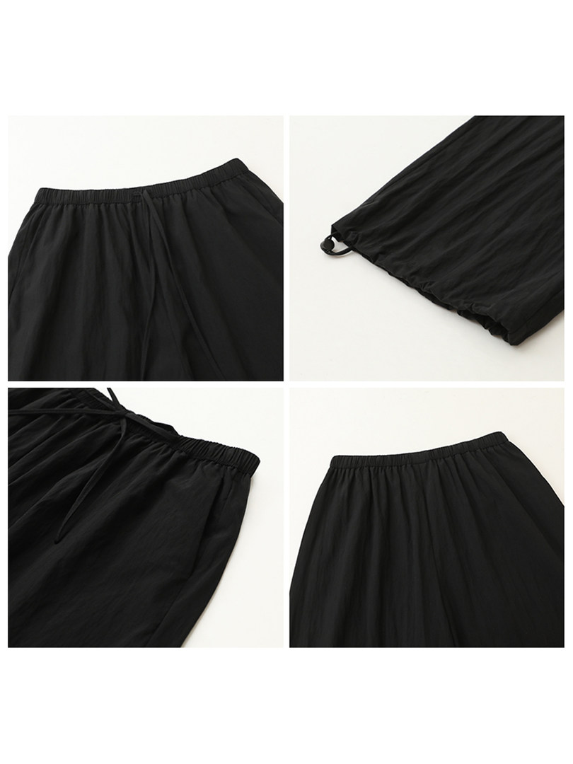 Black elastic-waist wide-leg pants shown from multiple angles on a white background